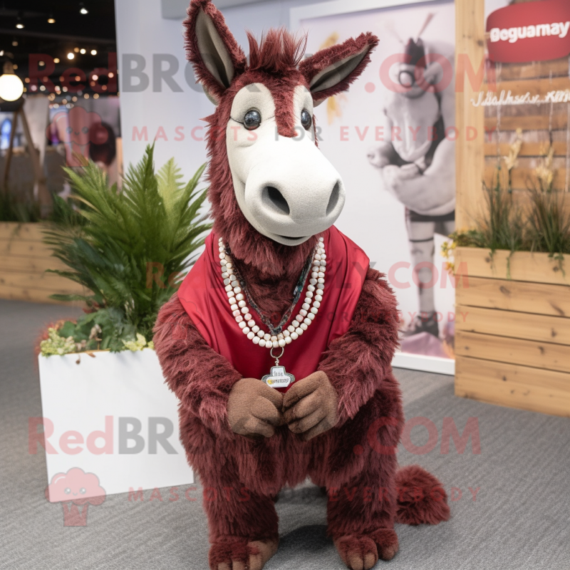 Maroon Donkey mascot costume character dressed with a Waistcoat and Necklaces Maroon Donkey mascot costume character dressed with a Waistcoat and Necklaces