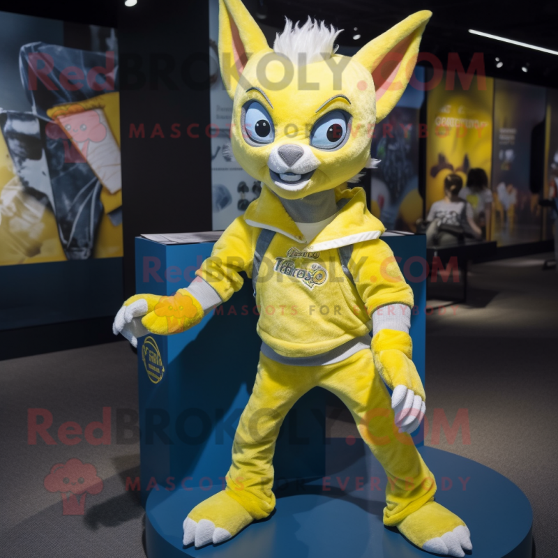 Lemon Yellow Chupacabra mascot costume character dressed with a Jeans and Wraps Lemon Yellow Chupacabra mascot costume character dressed with a Jeans and Wraps