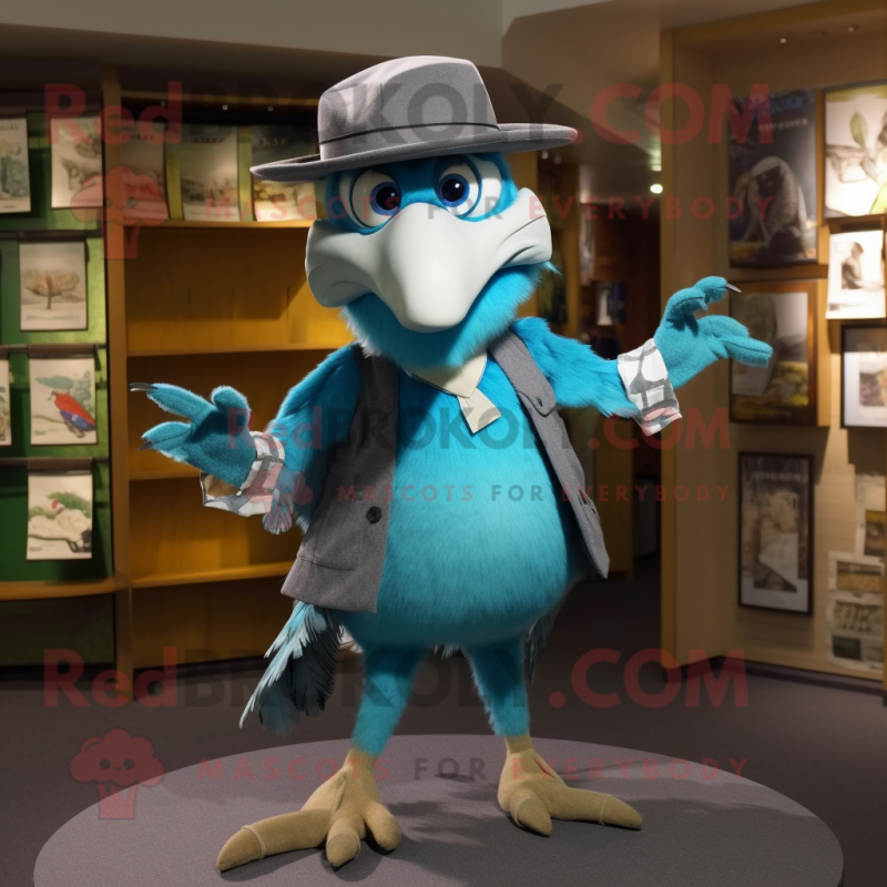 Turquoise Archeopteryx mascot costume character dressed with a Oxford Shirt and Hat pins