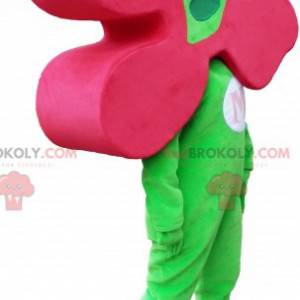 Green snowman mascot with a flower as a head - Redbrokoly.com