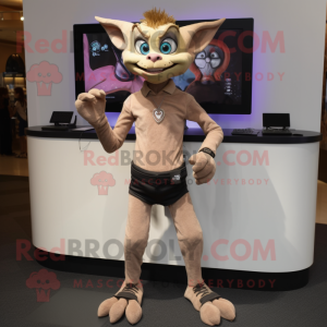 Tan Gargoyle mascot costume character dressed with a Skinny Jeans and Digital watches