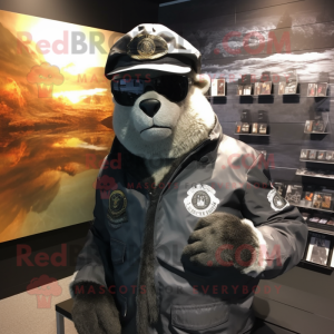 Silver Navy Seal mascot costume character dressed with a Leather Jacket and Hat pins