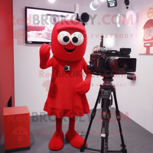 Red Camera mascot costume character dressed with a Skirt and Gloves