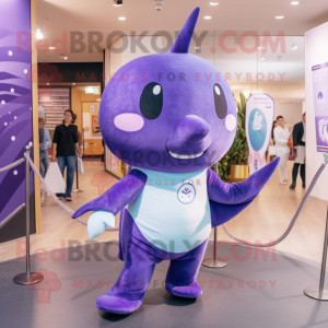 Purple Narwhal mascot costume character dressed with a Trousers and Wraps