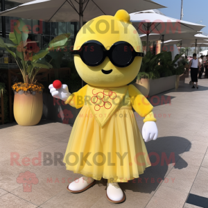 Lemon Yellow Dim Sum mascot costume character dressed with a Dress and Sunglasses