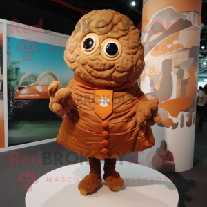 Brown Croissant mascot costume character dressed with a Playsuit and Shawl pins
