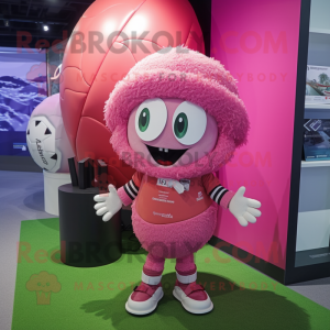 Pink Rugby Ball mascot costume character dressed with a Cover-up and Beanies