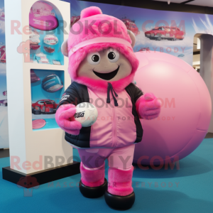 Pink Rugby Ball mascot costume character dressed with a Cover-up and Beanies