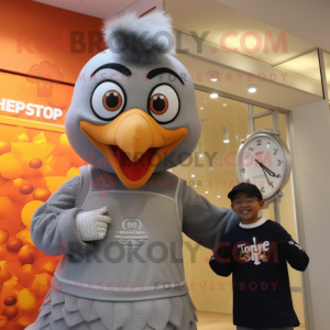 Silver Turkey mascot costume character dressed with a Sweater and Watches