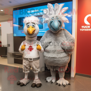 Silver Turkey mascot costume character dressed with a Sweater and Watches