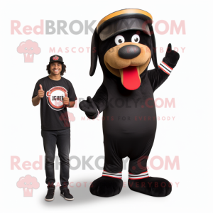 Black Hot Dog mascot costume character dressed with a Chinos and Rings