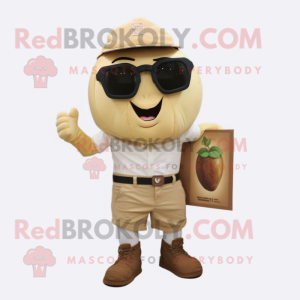 Beige Mango mascot costume character dressed with a Cargo Shorts and Sunglasses