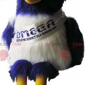 Blue and white vulture mascot with huge yellow legs -