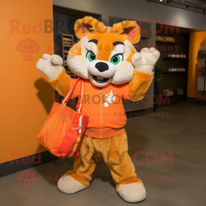 Orange Lynx mascot costume character dressed with a Jacket and Tote bags