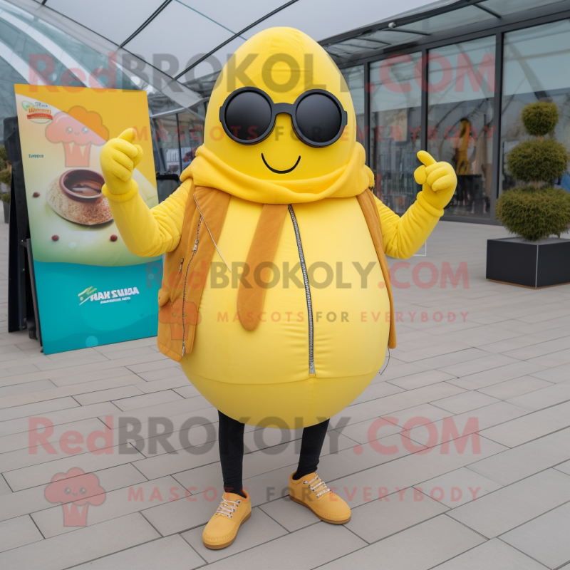 Lemon Yellow Shakshuka mascot costume character dressed with a Leather Jacket and Scarves