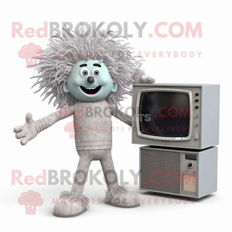 Silver Television mascot costume character dressed with a Jumpsuit and Hair clips Silver Television mascot costume character dressed with a Jumpsuit and Hair clips