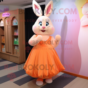Peach Rabbit mascot costume character dressed with a Dress and Shoe clips