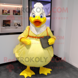 Lemon Yellow Muscovy Duck mascot costume character dressed with a Wrap Skirt and Clutch bags