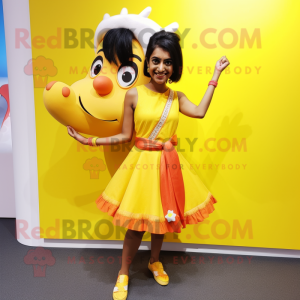 Yellow Tikka Masala mascot costume character dressed with a Mini Skirt and Hair clips