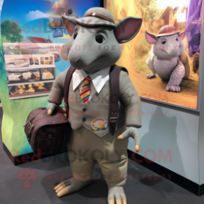 nan Armadillo mascot costume character dressed with a Suit Jacket and Briefcases