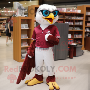 Maroon Falcon mascot costume character dressed with a Polo Shirt and Reading glasses