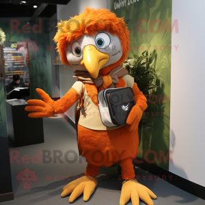 Orange Harpy mascot costume character dressed with a Waistcoat and Backpacks