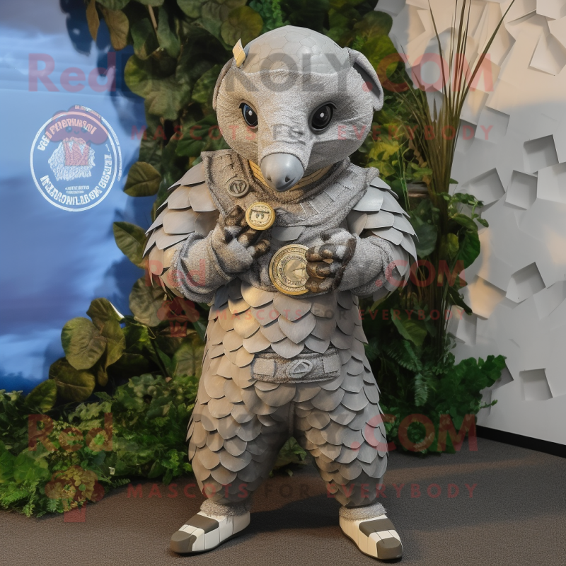 Silver Pangolin mascot costume character dressed with a Overalls and Rings Silver Pangolin mascot costume character dressed with a Overalls and Rings
