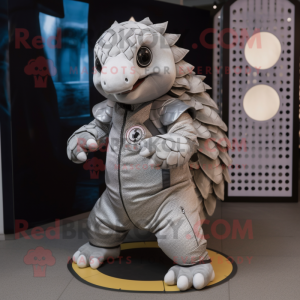 Silver Pangolin mascot costume character dressed with a Overalls and Rings