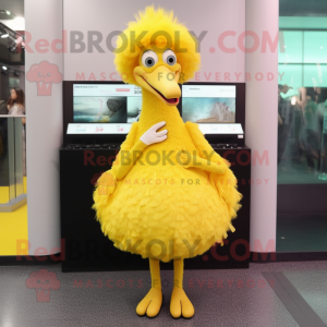 Yellow Ostrich mascot costume character dressed with a Skirt and Earrings