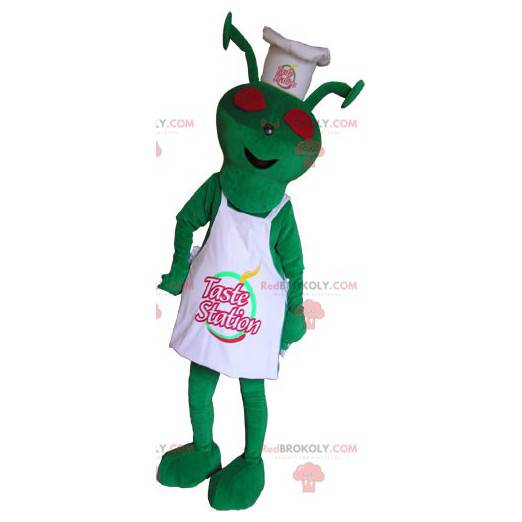 Buitenaardse mascotte gekleed in de outfit van de chef -