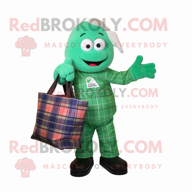 Green Astronaut mascot costume character dressed with a Flannel Shirt and Tote bags Green Astronaut mascot costume character dressed with a Flannel Shirt and Tote bags