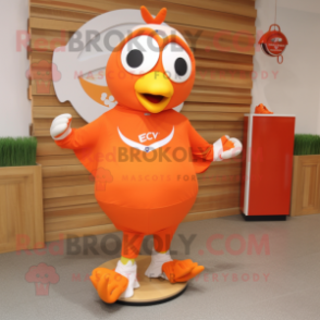 Orange Dove mascot costume character dressed with a Rash Guard and Headbands