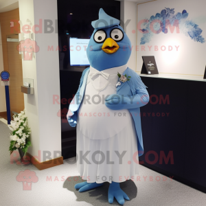 Blue Blackbird mascot costume character dressed with a Wedding Dress and Pocket squares