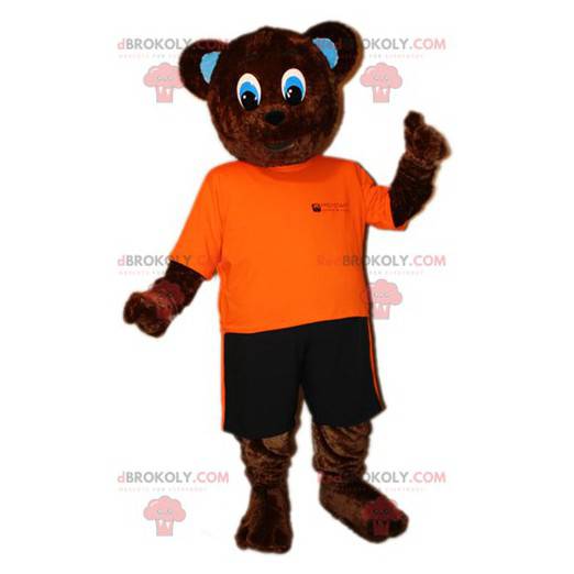 Braunbärenmaskottchen im orange-schwarzen Outfit -