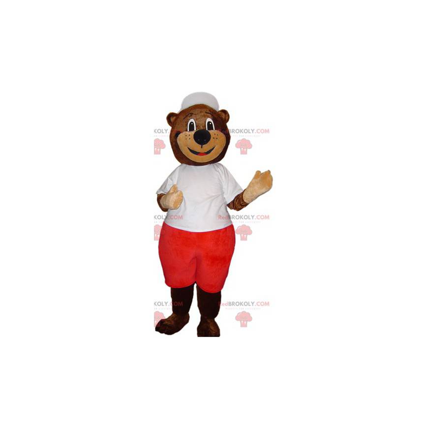 Mascotte d'ours marron en tenue blanche et rouge -