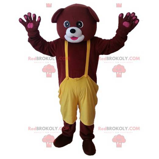 Brun björnmaskot med gula overaller - Redbrokoly.com