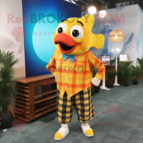 Yellow Clown Fish mascot costume character dressed with a Flannel Shirt and Cufflinks