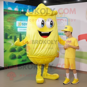 Lemon Yellow Lasagna mascot costume character dressed with a Jumpsuit and Caps