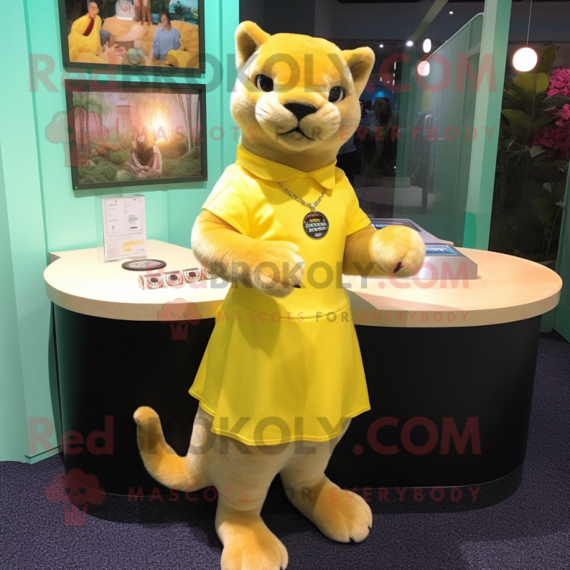 Lemon Yellow Jaguarundi mascot costume character dressed with a Mini Skirt and Cufflinks Lemon Yellow Jaguarundi mascot costume character dressed with a Mini Skirt and Cufflinks