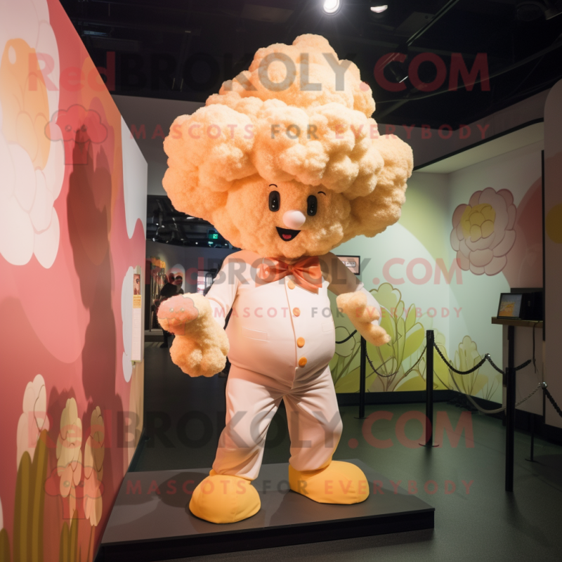 Peach Cauliflower mascot costume character dressed with a Romper and Hat pins Peach Cauliflower mascot costume character dressed with a Romper and Hat pins
