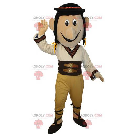 Homem mascote vestido com roupa tradicional do deserto -