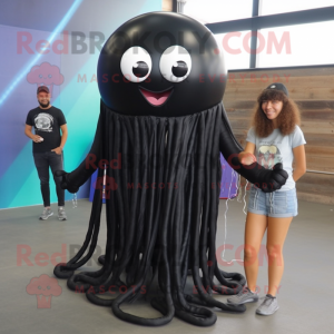 Black Jellyfish mascot costume character dressed with a V-Neck Tee and Shoe laces