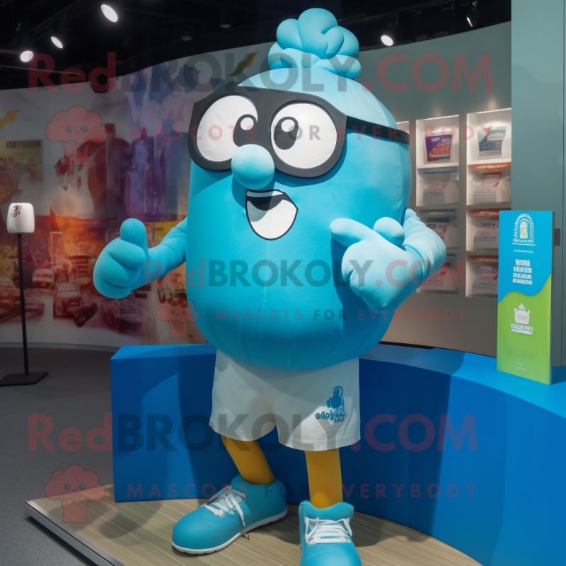 Cyan Boxing Glove mascot costume character dressed with a Running Shorts and Eyeglasses