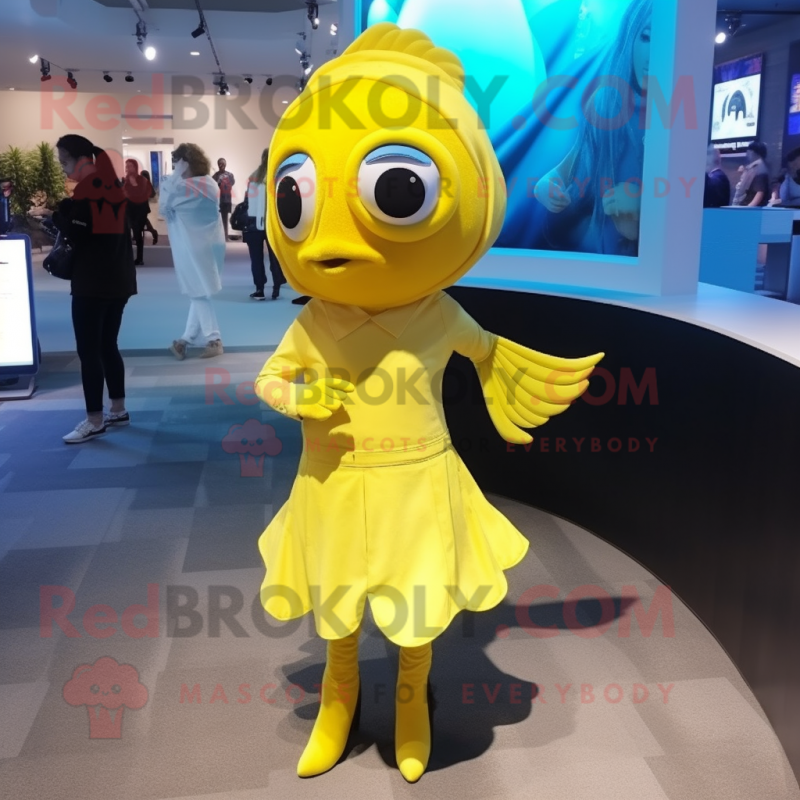 Lemon Yellow Betta Fish mascot costume character dressed with a Mini Skirt and Cufflinks Lemon Yellow Betta Fish mascot costume character dressed with a Mini Skirt and Cufflinks