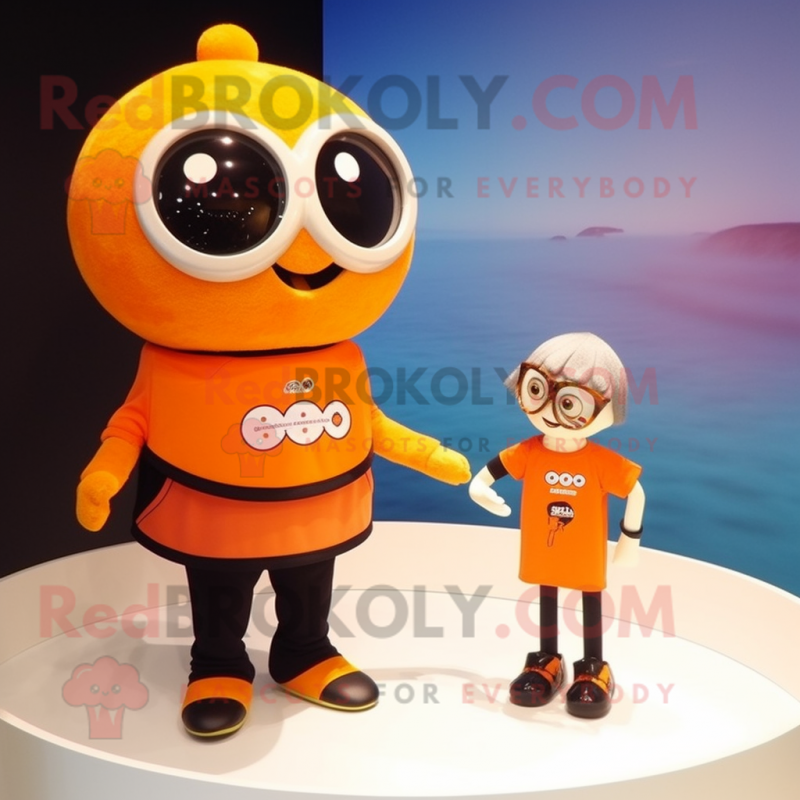 Orange Miso Soup mascot costume character dressed with a One-Piece Swimsuit and Bracelet watches Orange Miso Soup mascot costume character dressed with a One-Piece Swimsuit and Bracelet watches