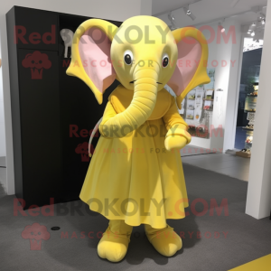 Lemon Yellow Elephant mascot costume character dressed with a Dress and Clutch bags