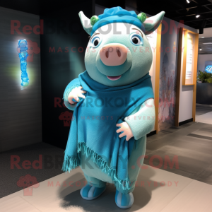 Turquoise Pig mascot costume character dressed with a Cardigan and Shawls