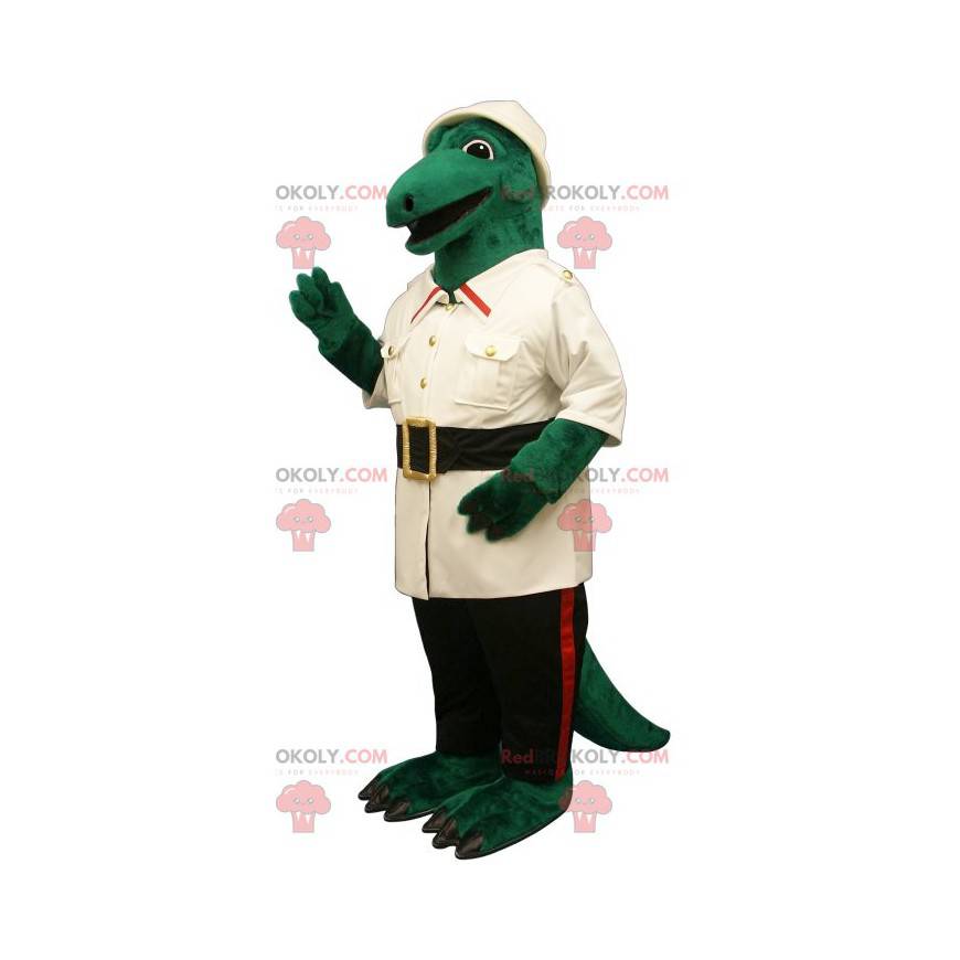 Grön krokodilmaskot klädd som en upptäcktsresande -