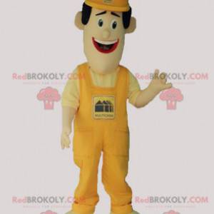 Homem mascote de macacão e boné amarelo - Redbrokoly.com