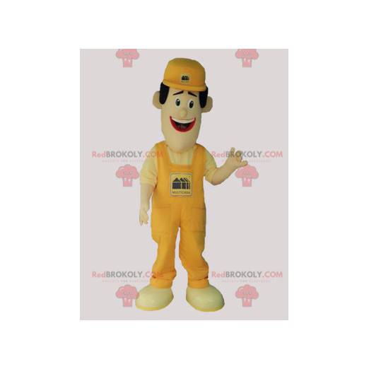 Homem mascote de macacão e boné amarelo - Redbrokoly.com